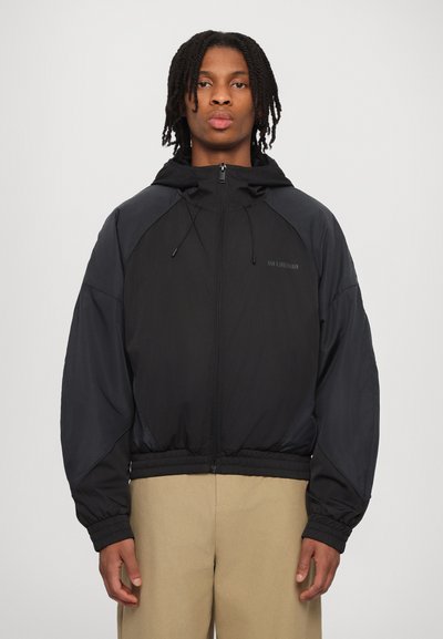 Han Kjøbenhavn PANELLED TRACK JACKET - Mezisezónní bunda - anthracite black