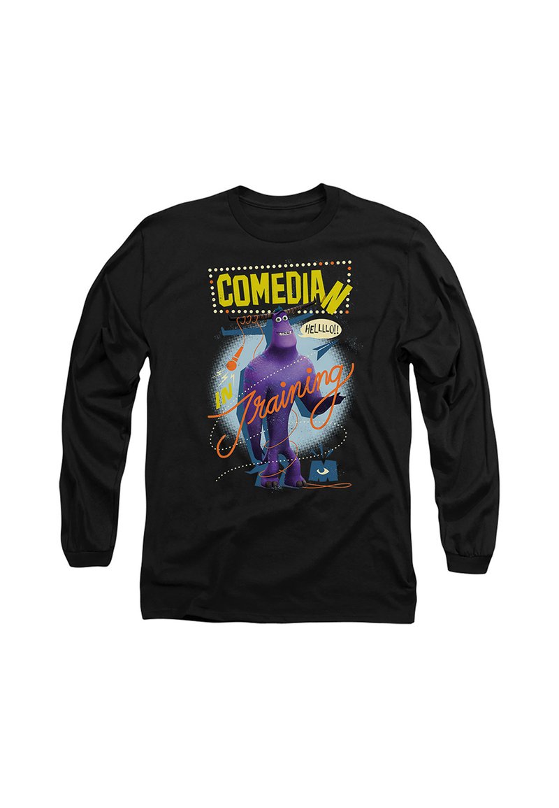 Black long-sleeve shirt with a purple monster holding a microphone and text reading "Comedian in Training" in yellow and orange letters.