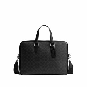 Borsa per laptop in pelle nera con motivo, manici doppi, tracolla removibile e chiusura con cerniera, mostrata su sfondo bianco.