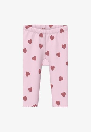 Leggings bébé roses côtelés avec un motif de cœurs rouges dispersés et des ourlets festonnés.