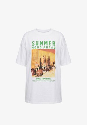 White t-shirt with green text "SUMMER MOOD AHEAD," a desert cactus and pots photo, and smaller text "SOUL TRAVELER" and a quote below.