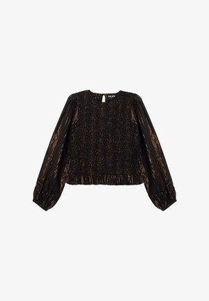 Blouse noire avec manches longues bouffantes, texture smockée, accents dorés et ourlet à volants. Fermeture au dos avec une ouverture en forme de goutte.