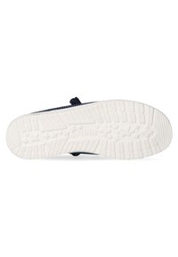 Semelle extérieure en caoutchouc blanc avec un motif de traction texturé ; tige en toile bleu foncé avec des coutures contrastées et un détail de logo.