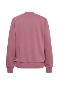 Lyserød sweatshirt med rund hals, lange ærmer og ribbede manchetter. Glat tekstur; har en afslappet pasform og elastisk kant forneden.