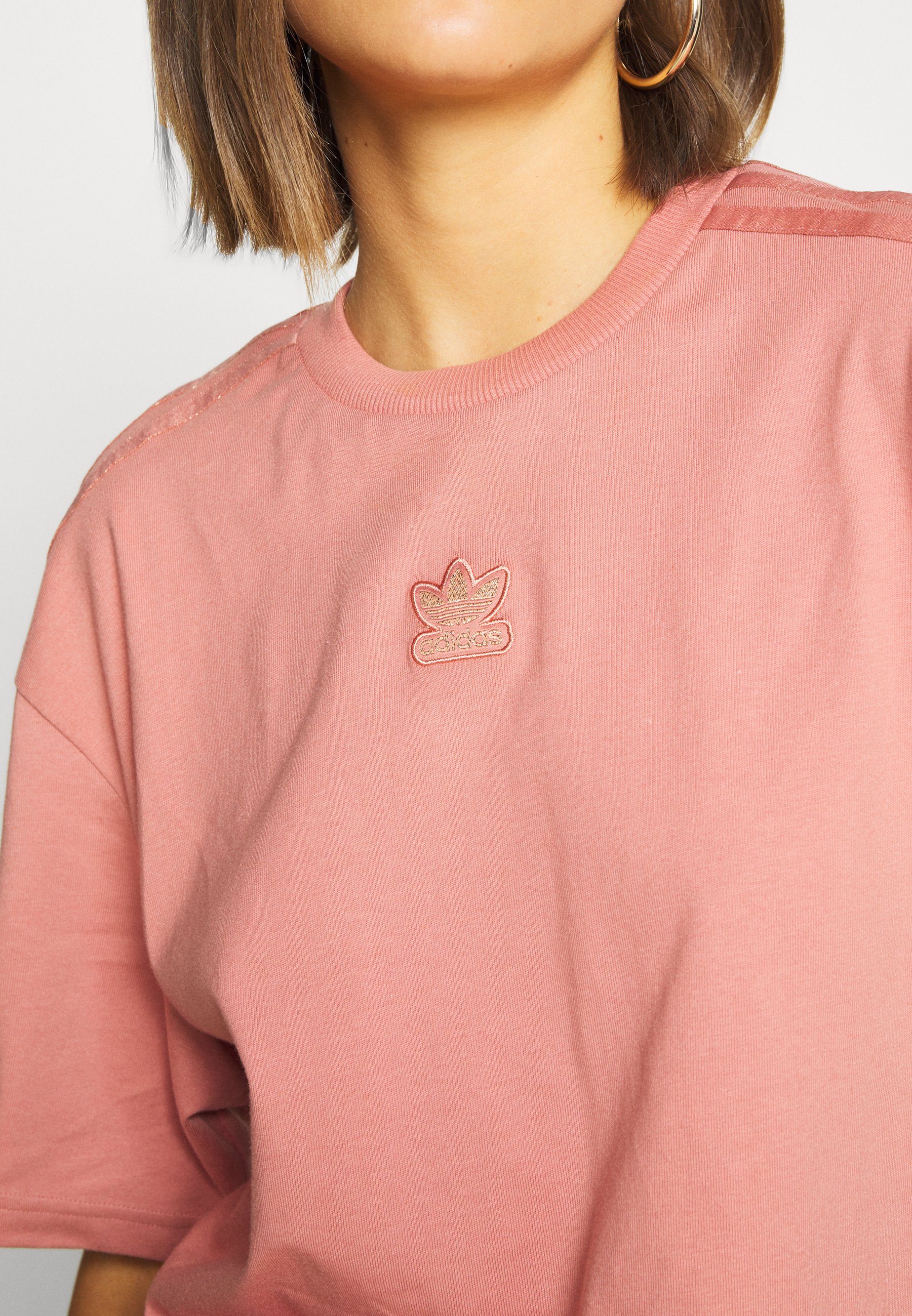 ash pink adidas shirt