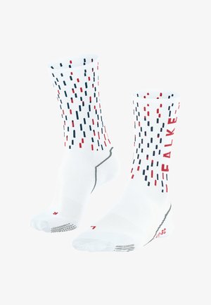White athletic socks with red and navy blue vertical striped pattern, reinforced toe and heel, featuring "FALKE" logo in red on side.