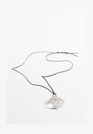 Silver pendant necklace with an abstract shape, hanging from a black cord. The pendant features a smooth, reflective surface.