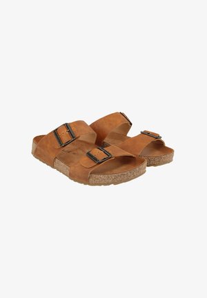 Braune Leder-Sandalen mit zwei verstellbaren Riemen, schwarzen Metall-Schnallen und einem strukturierten Korkfußbett. Flache Sohle mit einer leichten Erhöhung.