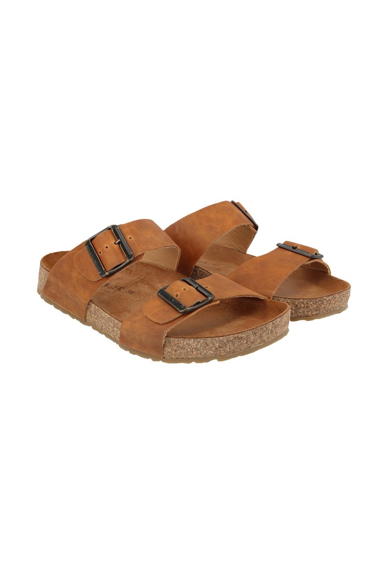 Brown leather sandals with two adjustable straps, black metal buckles, and a textured cork footbed. Flat sole with a slight elevation.