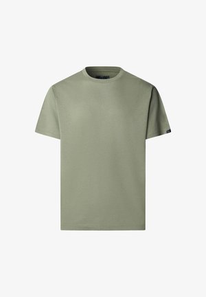 T-shirt uni à manches courtes et col rond en vert doux avec une petite étiquette noire sur la manche gauche.