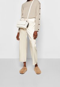 By Malene Birger Svetr - sand