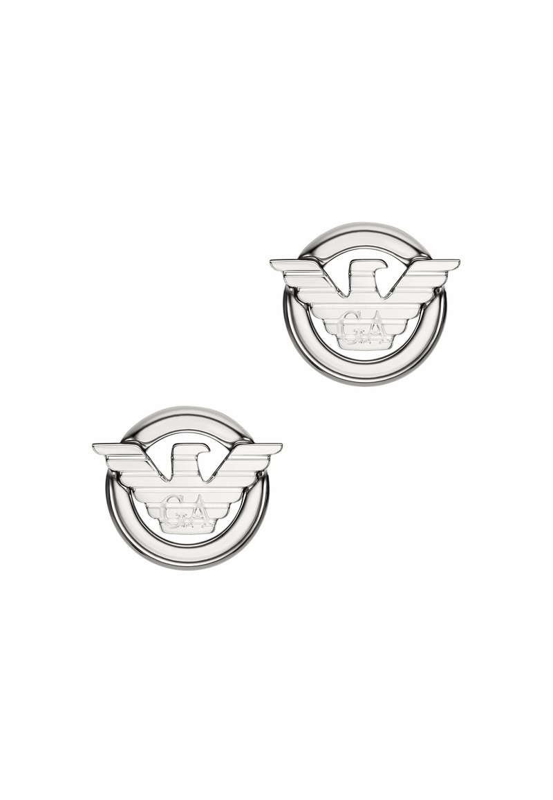 Orecchini in metallo argentato con design circolare, emblema di un'aquila e lettering "GA", dettagli testurizzati e finitura lucida.