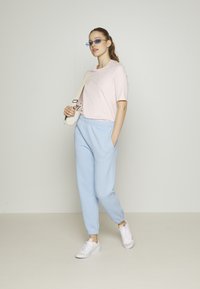 Lacoste Calças de fato de treino - bleu