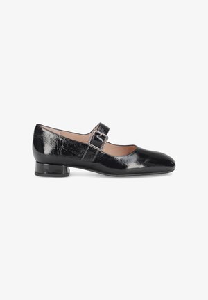 Black patent leather Mary Jane shoe with a low block heel, rounded toe, and an adjustable strap featuring a rectangular buckle.