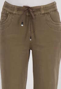 Niet geselecteerd, bruin