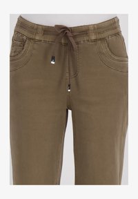 Niet geselecteerd, bruin