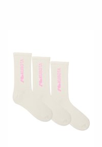 Kremowe skarpetki KUBOTA z prążkowaną teksturą i różowym nadrukiem logo z boku. W opakowaniu znajdują się trzy pary.