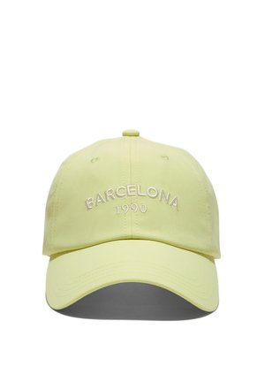 Svetložltá šiltovka s výšivkou "BARCELONA 1990" v bielej farbe na prednej strane, pohľad spredu z centra.