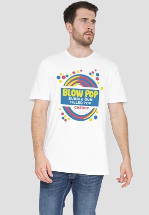 White cotton T-shirt featuring "BLOW POP" graphic in blue and colorful circular design, with red, blue, and yellow accents. Casual fit.