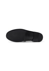 Suela de zapato negra con una superficie lisa y plana. Presenta una marca mínima y un borde texturizado para mayor agarre. Sin patrones ni elementos visibles.
