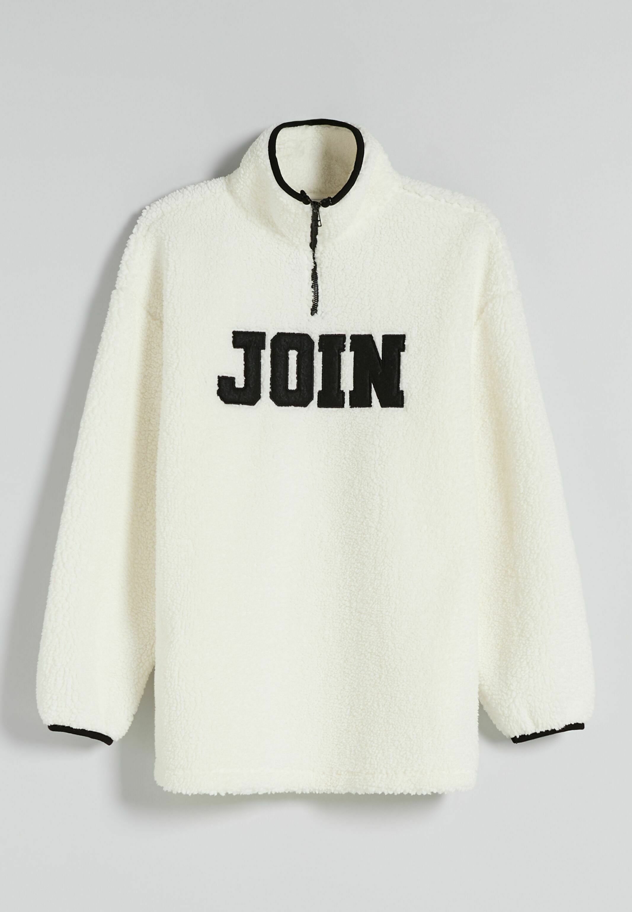 white fleece jumper