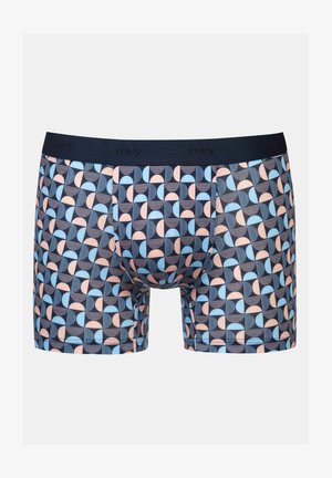Navy boxershorts met een geometrisch patroon in roze en blauw. Voorzien van een zachte tailleband met branding. Gemaakt van rekbaar katoen.
