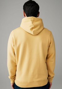 Next STANDARD - Sweat à capuche - yellow