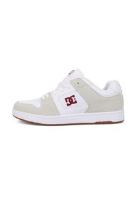 White athletic shoe with suede gray accents, rubber sole, and a prominent red logo on the side. Features classic lace-up design and padded collar.