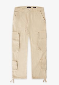 Beige cargobroek van katoenen twill, met twee zijzakken, twee grote cargozakken en striksluitingen aan de onderkant.