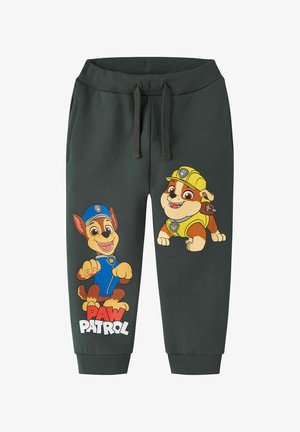 Mørkegrå børnejoggingbukser med Paw Patrol-figurerne Chase i blå uniform og Rubble i gul uniform trykt på forbenene.