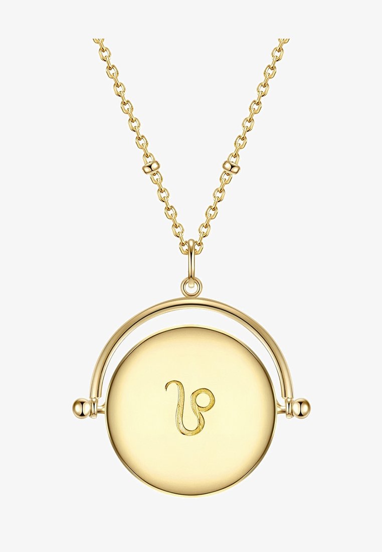 Arany nyaklánc, amelyen egy sima felületű kör alakú medál és egy stilizált zodiákus szimbólum található. A lánc kerek díszeket és láncszemeket tartalmaz.