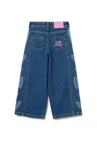 Denim-Culottes in Mittelblau mit einer lockeren Passform. Mit besticktem "LOVE THERAPY" auf der Gesäßtasche und dezenten Herzmustern an den Seiten.