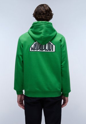 Groene hoodie van een katoenmix, met een groot zwart-wit logo op de achterkant. Het heeft een capuchon met trekkoord en ribbels aan de manchetten.