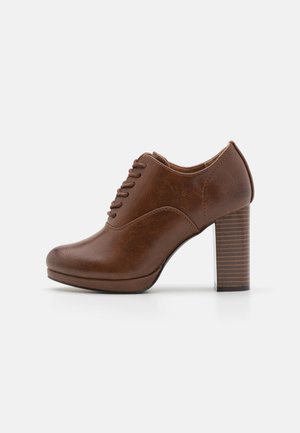 High heeled ankle boots - cognac