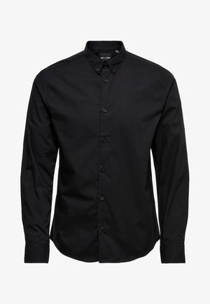 Black long-sleeve button-up shirt made of cotton. Features a classic collar, front buttons, and a straight hem with no patterns or embellishments.