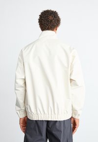 Ellesse DE ROSSI - Poletna jakna - beige