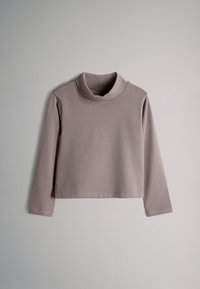 Licht mauve coltrui met lange mouwen, gemaakt van zachte stof. Heeft een losse pasvorm met een gebogen halslijn en afgewerkte zoom.