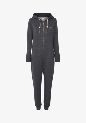 Szürke, cipzáras, egyberészes ruházat puha anyagból, kapucnival, díszítő elemekkel ellátott húzózsinórral és rugalmas mandzsettával a bokáknál és a csuklóknál.