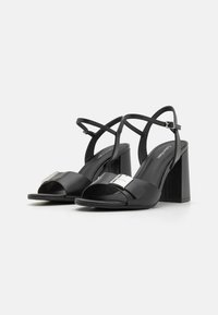 Calvin Klein Sandales à talons hauts black/noir ZALANDO
