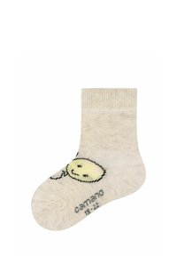 Calza beige al ginocchio realizzata in materiale morbido, con un design di faccina sorridente in giallo e nero, orlo a coste e etichetta del marchio stampata.