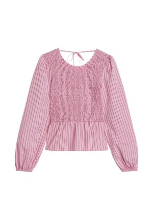 Ροζ μπλούζα με μακριά μανίκια και κάθετες μαύρες ρίγες, με σφηκοφωλιά στο μπροστινό μέρος, σούρες στη μέση και κλείσιμο με κορδέλα στο πίσω μέρος του λαιμού.