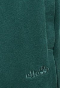 Ellesse PAULLO - Tepláky - dark green