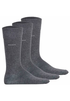 Graue Baumwollsocken, kniehoch, mit geripptem Bündchen oben, glatter Textur und dezentem Branding nahe dem Knöchel. Dreier-Pack.