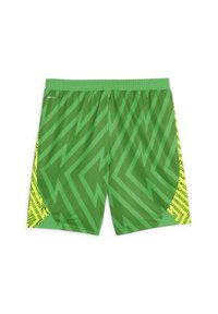 Zöld sportnadrág zigzag mintával, amelynek oldalán textúrás sárga panel található geometrikus mintákkal. Könnyű, légáteresztő anyagból készült.