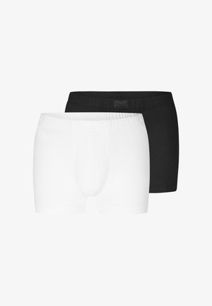 Zwei Paar Herren-Boxershorts, eines weiß und eines schwarz, flach liegend mit elastischen Taillenbändern vor einem schlichten weißen Hintergrund.