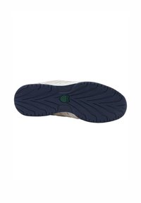 Sola della scarpa con un profondo motivo di battistrada, realizzata in materiale gommoso blu navy e con un dettaglio del logo verde al centro.