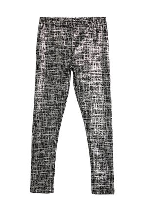Zwart-witte legging met een strakke pasvorm, elastische tailleband en een textiel met een roosterachtig ontwerp.