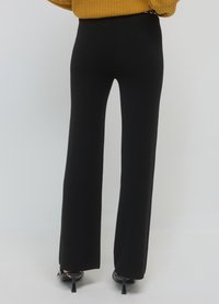 Calliope GINNICO IN - Stoffhose - nero