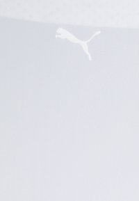 White athletic fabric featuring a subtle mesh texture, with a large white Puma logo of a leaping cat positioned on one side.
