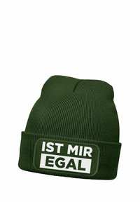 Green knitted beanie with a cuffed brim featuring bold, white text that reads "IST MIR EGAL" on a rectangular patch.
